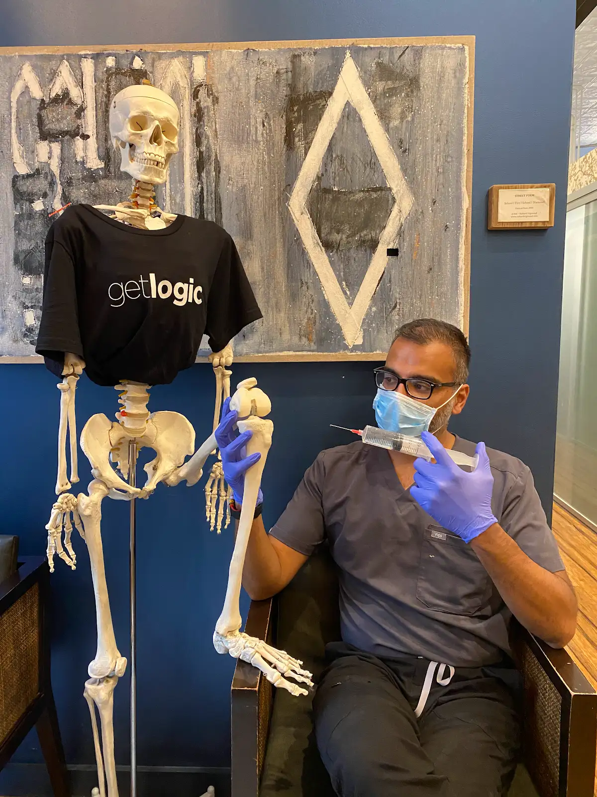 Dr. Palvia with medical model